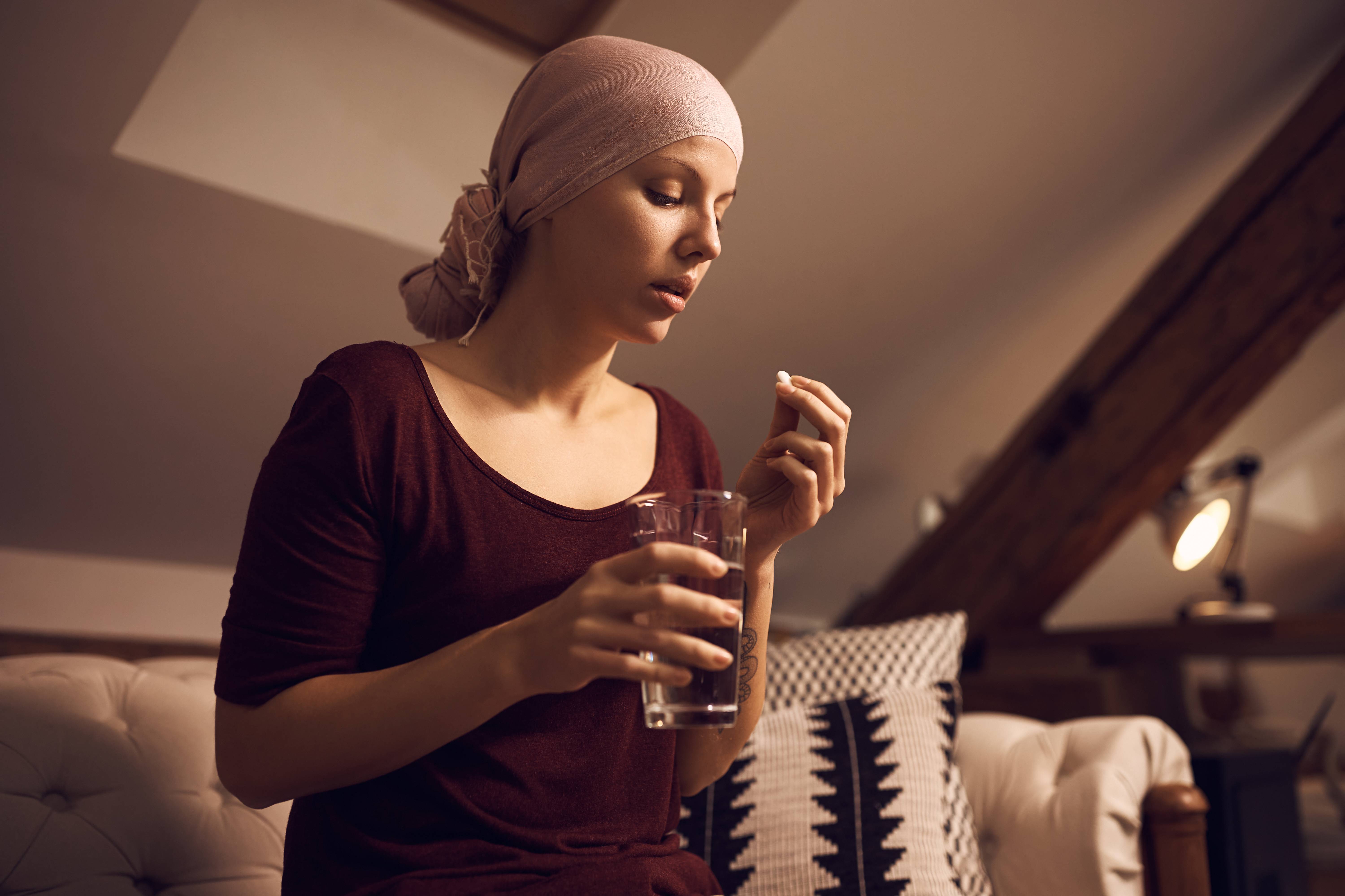 Scientist in a lab researching new cancer treatments