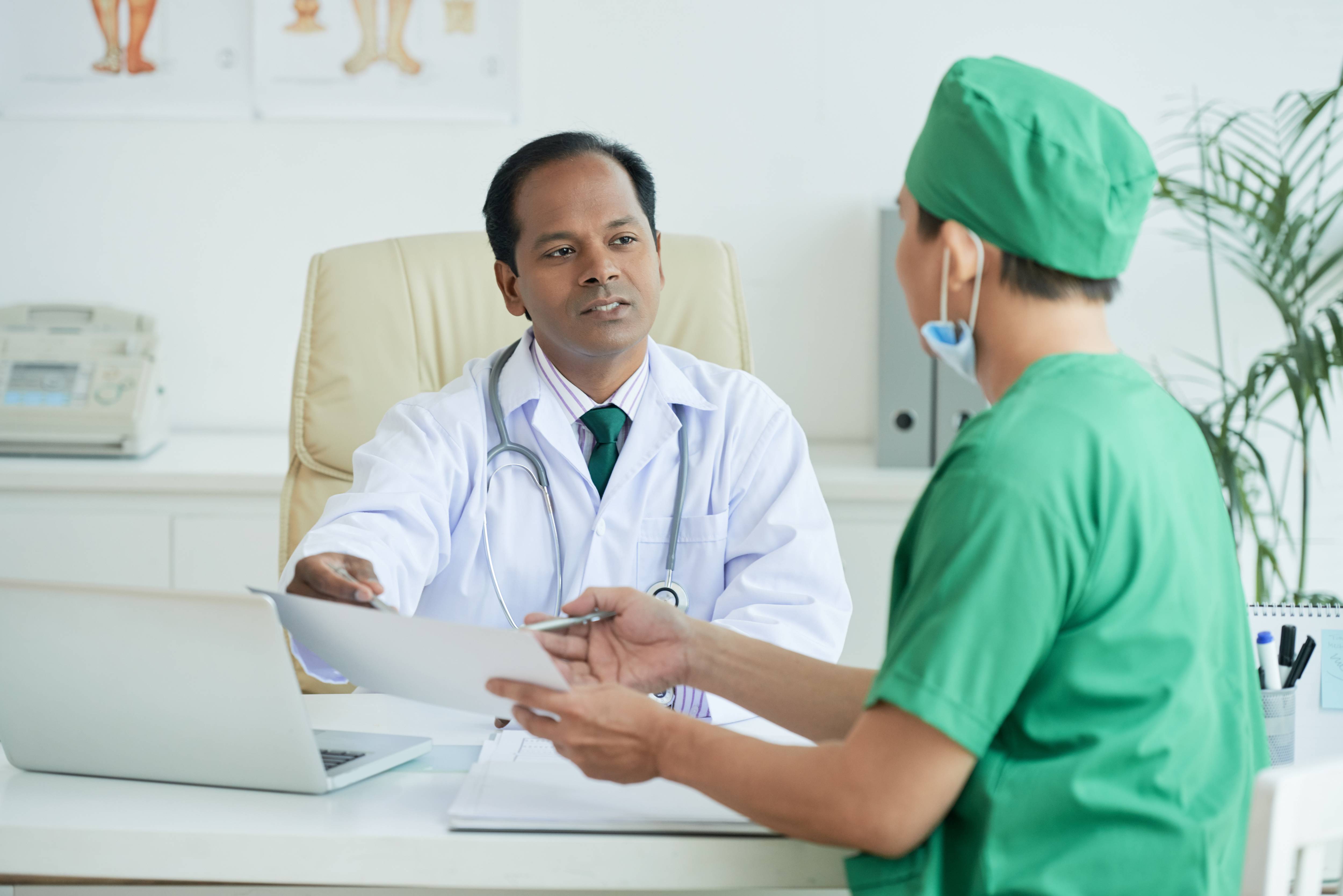 Oncologist explaining prostate cancer treatment options